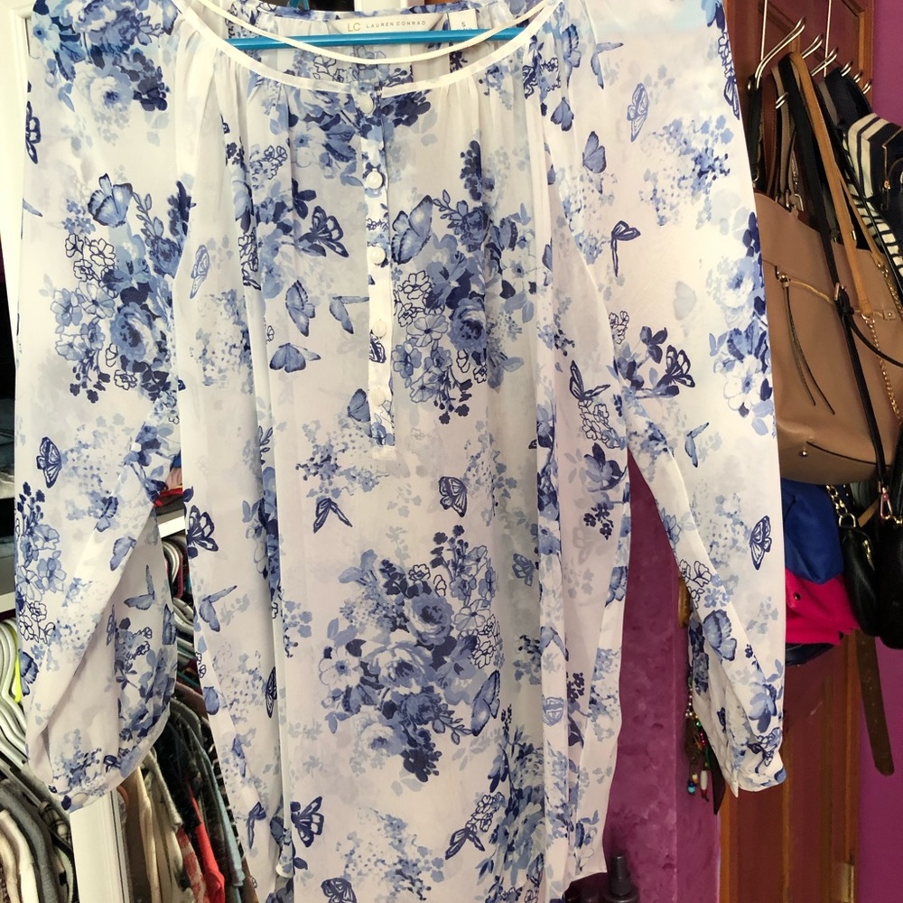 White and blue floral blouse